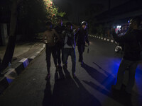 Group of Muslims try to attack Indonesian Law Aid building at Diponegoro street where inside the building there were held discussion about t...