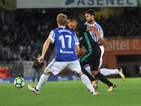 Varane of Real Madrid duels for the ball with Zurutuza and Willian Jose of Real Sociedad during the Spanish league football match between Re...