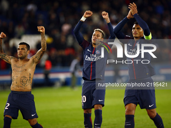 Daniel Alves, Neymar Jr, Thiago Silva of PSG reacts during the Ligue 1 match between Paris Saint Germain and Olympique Lyonnais at Parc des...