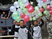 Nepalese army personnel carrying halogen balloons for the celebration of Nepalese Constitution Day at Nepal Army Pavilion, Tundikhel, Kathma...
