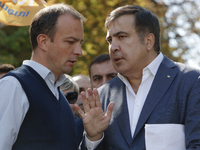 Former Georgian President and former Odessa Region Governor Mikheil Saakashvili talks to lawmaker Yehor Soboliev in front of the Presidentia...