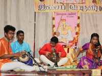 Youth perform a classical song in the traditional Carnatic style of music during the Thiruvaiyaru Music and Dance Festival held in Toronto,...