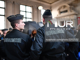 Policemen in Paris, France, on 19 September 2017 during opening of the trial in the Quai de Valmy case, where  a police car was set on fire...