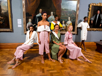 Models pose at the Tata Naka Presentation during the London Fashion Week September 2017 in London on September 18, 2017. (