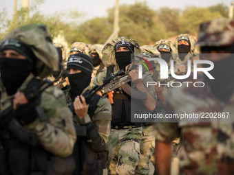 Palestinian militants of the al-Nasser Saladin Brigades take part in a drill in Khan Younis in the southern Gaza Strip September 19, 2017. (
