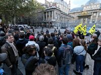 Demonstrators take part in a rally in front of  Paris courthouse on September 19, 2017  during the trial of nine people over an attack by de...