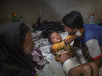 A wounded Rohingya kid is admitted to the hospital as he got burn injury since Myanmar military torched his house.  Cox’s Bazar Hospital, Ch...