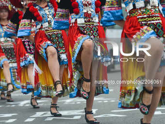 Young dancers wearing traditional colorful dresses during a dance demonstration ahead of the start to the the opening stage of the 2017 Tour...