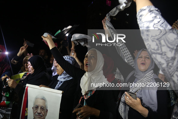 Palestinian supporters of Fateh movement and Palestinian president Mahmud Abbas (portrait) gather in Gaza City as Abbas addresses the 72nd U...