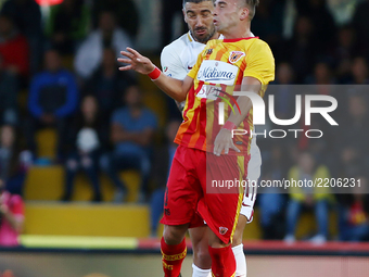 Lorenzo Venuti (R) of Benevento competes for the ball in air with Aleksandar Kolarov (L) of Roma during the Serie A match between Benevento...