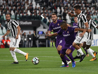 Fiorentina defender Vincent Laurini (2) thwarted by Juventus forward Paulo Dybala (10) during the Serie A football match n.5 JUVENTUS - FIOR...