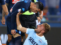 A discussion between Jose Maria Callejon of Napoli and Ciro Immobile of Lazio  during the Serie A match between SS Lazio and SSC Napoli at S...