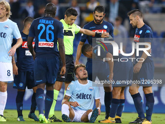 Ciro Immobile of Lazio and Allan Loudeiro of Napoli  during the Serie A match between SS Lazio and SSC Napoli at Stadio Olimpico on Septembe...