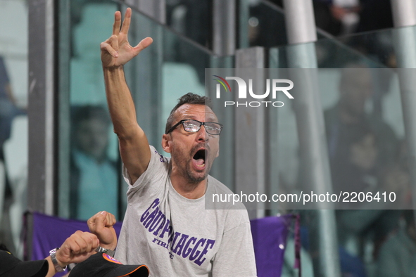 A fan of ACF Fiorentina during the Serie A football match between Juventus FC and ACF Fiorentina at Allianz Stadium on 20 September, 2017 in...
