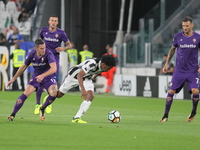 Juan Cuadrado (Juventus FC) in action during the Serie A football match between Juventus FC and ACF Fiorentina at Allianz Stadium on 20 Sept...