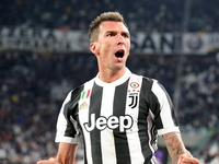 Mario Mandzukic (Juventus FC) celebrates after scoring the goal of the win during the Serie A football match between Juventus FC and ACF Fio...