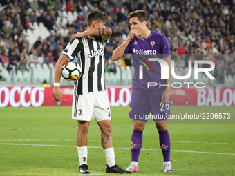 Paulo Dybala (Juventus FC) and Federico Chiesa (ACF Fiorentina) during the Serie A football match between Juventus FC and ACF Fiorentina at...