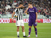 Paulo Dybala (Juventus FC) and Federico Chiesa (ACF Fiorentina) during the Serie A football match between Juventus FC and ACF Fiorentina at...