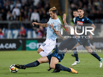 Luis Alberto of Lazio is challenged by Christian Maggio of Napoli during the Serie A match between Lazio and Napoli at Olympic Stadium, Roma...