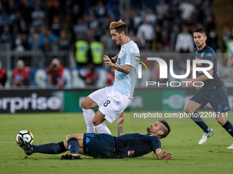 Luis Alberto of Lazio is challenged by Christian Maggio of Napoli during the Serie A match between Lazio and Napoli at Olympic Stadium, Roma...