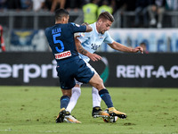 Sergej Milinkovic-Savic of Lazio is challenged by Allan of Napoli during the Serie A match between Lazio and Napoli at Olympic Stadium, Roma...
