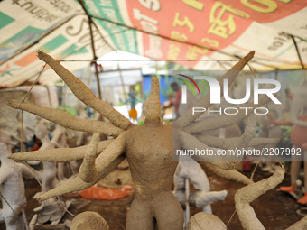 An ongoing clay idol of the Hindu Goddess Durga, which is being transported to worship in different parts of Kathmandu Valley on Wednesday,...