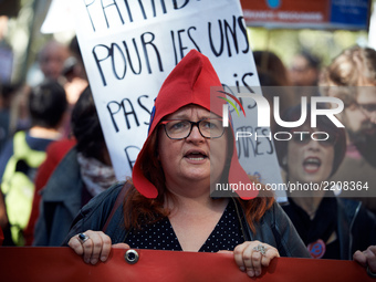A demonstrator with a phrygian cap shouts slogans against MAcron's policies during a protest in Toulouse against the new Macron's reforms on...