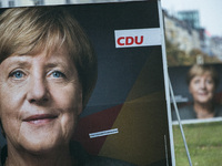Election posters of German Chancellor Angela Merkel (CDU) are pictured in the district of Friedrichshain in Berlin, Germany on September  21...