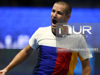 Mikhail Youzhny of Russia reacts during the St. Petersburg Open ATP tennis tournament match in St. Petersburg, Russia, Thursday, Sept. 21, 2...