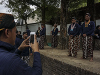 Javanese people follows the ritual of Nguras Enceh ceremony in the complex of the Tomb Kings Mataram at Yogyakarta, Indonesia, on September...