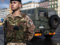 Italian troops stand guard outside the Central Station by Naples, Campania Grouping, Commandant is Colonel Salvatore Alessandro Sarci, Naple...