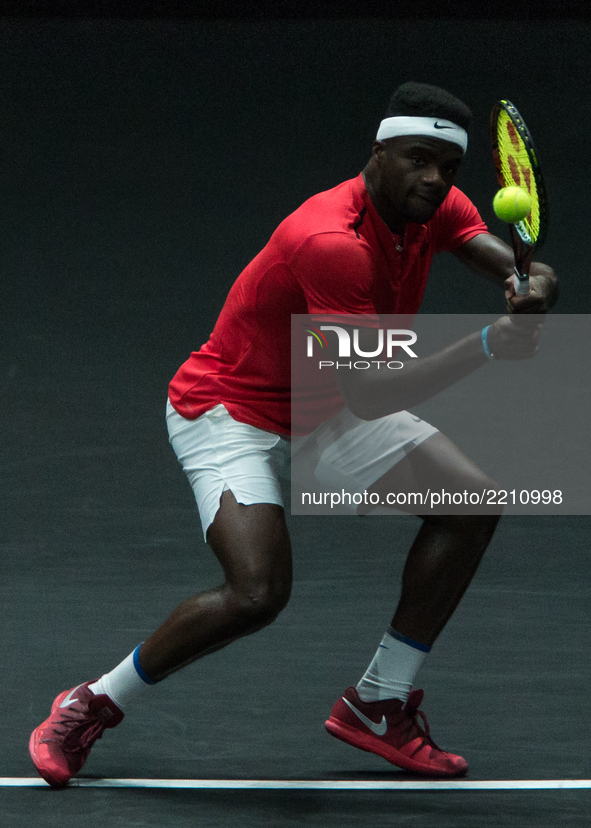 Team World player Frances Tiafoe of United States returns the ball to Team Europe player Marin Cilic of Croatia during the first day at Lave...