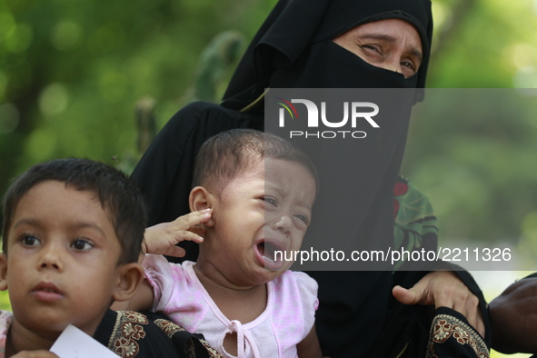 A Rohingya child cries for food after arrived in Teknaf from Myanmar’s Rakhine state on September 22, 2017. More than 400,000 Rohingya Musli...