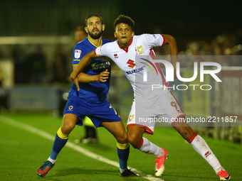 Osman Sow of MK Dons holds of AFC Wimbledon's George Francomb
during Sky Bet League One match between AFC Wimbledon  and MK Dons at  Kingsme...