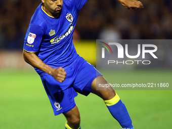 AFC Wimbledon's Kwesi Appiah takes on George Williams of MK Dons
during Sky Bet League One match between AFC Wimbledon  and MK Dons at  King...