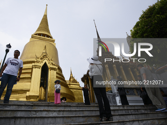 A Chinese tourist group visits the Emerald Buddha Temple inside the Grand Palace in Bangkok, Thailand, 23 September 2017.  The Grand Palace...
