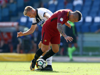 Jens Stryger of Udinese and Radja Nainggolan of Roma  during the Italian Serie A football match between AS Roma and Udinese on September 23,...