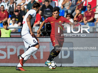 Diego Perotti of Roma is challenged by Gabriele Angella of Udinese during the Serie A match between Roma and Udinese at Olympic Stadium, Rom...