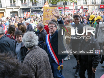 La France Insoumise (LFI) leftist party parliamentary group President Jean-Luc Melenchon (C)  gestures during a protest organized in Paris o...