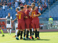 A.S. Roma players celebrates after scoring a goal during the Italian Serie A football match between A.S. Roma and Udinese at the Olympic Sta...