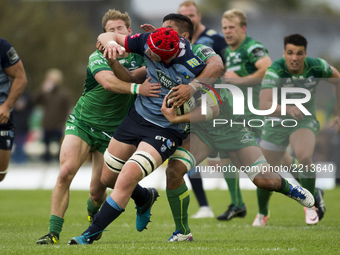 Seb Davies of Cardiff tackled by Jarrad Butler and Kieran Marmion of Connacht during the Guinness PRO14 Conference A match between Connacht...