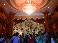 Indian people visits the Durga puja pandal or a temporary platforms of  Sreebhumi Sporting club in Kolkata, India on  Saturday, 23rd Septemb...