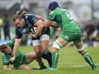 Kristian Dacey of Cardiff tackled by John Muldoon and Kieran Marmion of Connacht during the Guinness PRO14 Conference A match between Connac...
