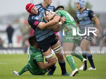 Seb Davies of Cardiff tackled by Cian Kelleher and Jarrad Butler of Connacht during the Guinness PRO14 Conference A match between Connacht R...