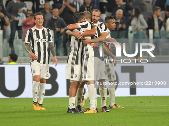 Paulo Dybala (Juventus FC, center) celebrates after scoring his second goal during the Serie A football match between Juventus FC and Torino...