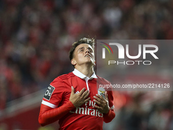 Benfica's midfielder Franco Cervi celebrates after scoring during the Portuguese League  football match between SL Benfica and FC Pacos de F...
