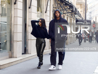 Younes Bendjima and Kourtney Kardashian are seen leaving the 'PSG' store on the Champs-Elysees Avenue in Paris, France, on September 26, 201...