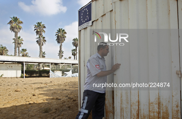 RAFAH, GAZA STRIP, PALESTINE - AUGUST 25: A Palestinian inspects the damage from an Israeli air strike to the departure lounge of the Rafah...
