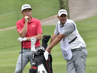 Cameron Smith of Australia chats with a caddy during the second round of the CIMB Classic 2017 golf tournament on October 13, 2017 at TPC Ku...