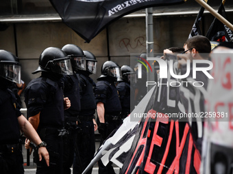  Riot police are present as anti-fascists group marched in Barcelona to protest against the Spanish National Day, in Barcelona on October 12...